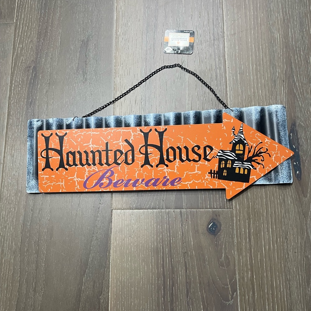 Holiday Inspirations Haunted House Beware metal sign 16 1/2 inches. NWT